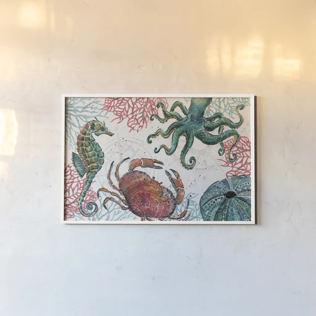 Ocean Finds I by Daphne Brissonnet. shown as a paper print in a white frame. Available as a archival giclee rolled canvas, fine art paper, or poster print. SKU 64725i.