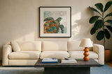 Ocean Finds X by Daphne Brissonnet. Displayed in a glass frame with matte in a clean modern living room. Available as an archival giclee rolled canvas, fine art paper, or poster print. SKU 64734a.