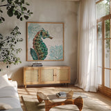 Ocean Finds XII by Daphne Brissonnet. Shown in a natural wood frame in a cozy modern living room. Available as an archival giclee rolled canvas, fine art paper, or poster print. SKU 64736a.