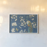 Ornate Peacock II Blue by Daphne Brissonnet. shown as a paper print in a white frame. Available as a archival giclee rolled canvas, fine art paper, or poster print. SKU 53875i.