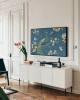 Ornate Peacock III by Daphne Brissonnet. shown as a framed stretched canvas in a living room above a console. Available as a archival giclee rolled canvas, fine art paper, or poster print. SKU 21846i.