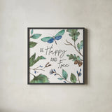 Outdoor Beauties I Color Be Happy and Free by Daphne Brissonnet. Shown in a sleek black glass frame for a contemporary gallery look. Available as an archival giclee rolled canvas, fine art paper, or poster print. SKU 57351a.