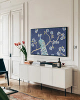 Peacock Allegory I Blue by Daphne Brissonnet. shown as a framed stretched canvas in a living room above a console. Available as a archival giclee rolled canvas, fine art paper, or poster print. SKU 37504i.