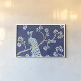 Peacock Allegory I Blue by Daphne Brissonnet. shown as a paper print in a white frame. Available as a archival giclee rolled canvas, fine art paper, or poster print. SKU 37504i.