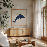 Primitive Sea VIII Navy by Daphne Brissonnet. Shown in a natural wood frame in a cozy modern living room. Available as an archival giclee rolled canvas, fine art paper, or poster print. SKU 65668a.