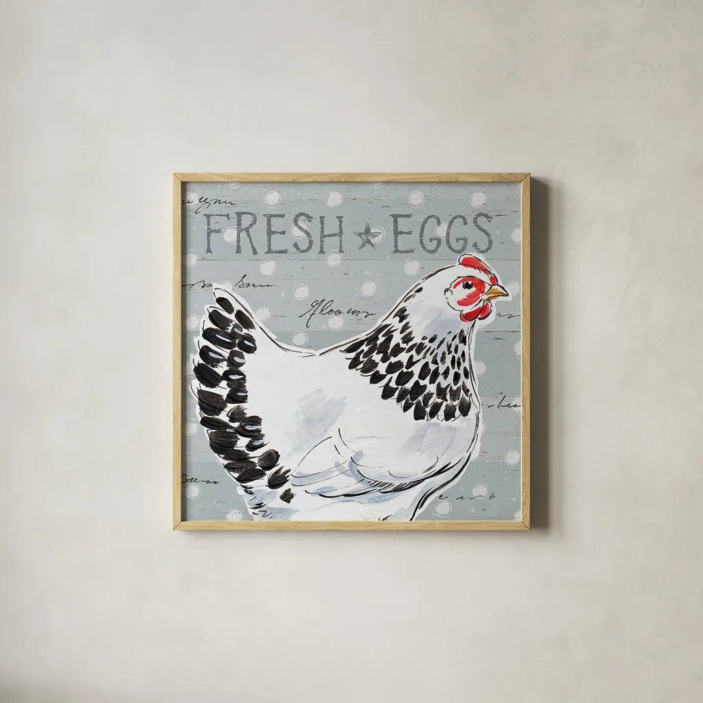 Roosters Call II by Daphne Brissonnet. Shown in a natural wood glass frame for a timeless modern aesthetic. Available as an archival giclee rolled canvas, fine art paper, or poster print. SKU 37488a.