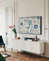 Spanish Impressions I Blue by Daphne Brissonnet. shown as a framed stretched canvas in a living room above a console. Available as a archival giclee rolled canvas, fine art paper, or poster print. SKU 77797i.