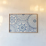 Spanish Impressions VIII Blue by Daphne Brissonnet. shown as a paper print in a natural frame. Available as a archival giclee rolled canvas, fine art paper, or poster print. SKU 77803i.