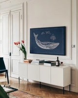 Underwater Life IX by Daphne Brissonnet. shown as a framed stretched canvas in a living room above a console. Available as a archival giclee rolled canvas, fine art paper, or poster print. SKU 33465i.