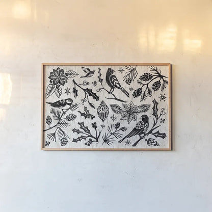 Woodcut Christmas II by Daphne Brissonnet. shown as a paper print in a natural frame. Available as a archival giclee rolled canvas, fine art paper, or poster print. SKU 69681i.