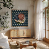 America Balloons III by David Carter Brown. Shown in a natural wood frame in a cozy modern living room. Available as an archival giclee rolled canvas, fine art paper, or poster print. SKU 98925a.