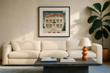 Merry Lil House Sq Merry Christmas by David Carter Brown. Displayed in a glass frame with matte in a clean modern living room. Available as an archival giclee rolled canvas, fine art paper, or poster print. SKU 37370a.