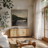 North Woods Bear II by David Carter Brown. Shown in a natural wood frame in a cozy modern living room. Available as an archival giclee rolled canvas, fine art paper, or poster print. SKU 26765a.