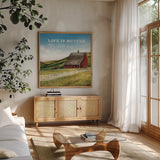 Old Red Barn with Words by David Carter Brown. Shown in a natural wood frame in a cozy modern living room. Available as an archival giclee rolled canvas, fine art paper, or poster print. SKU 27738a.