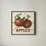 U-Pick Apples by David Carter Brown. Shown in a sleek black glass frame for a contemporary gallery look. Available as an archival giclee rolled canvas, fine art paper, or poster print. SKU 3182a.