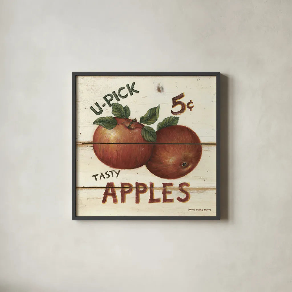 U-Pick Apples by David Carter Brown. Shown in a sleek black glass frame for a contemporary gallery look. Available as an archival giclee rolled canvas, fine art paper, or poster print. SKU 3182a.