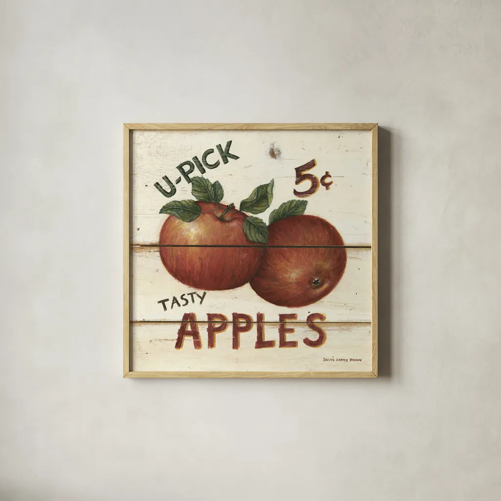 U-Pick Apples by David Carter Brown. Shown in a natural wood glass frame for a timeless modern aesthetic. Available as an archival giclee rolled canvas, fine art paper, or poster print. SKU 3182a.