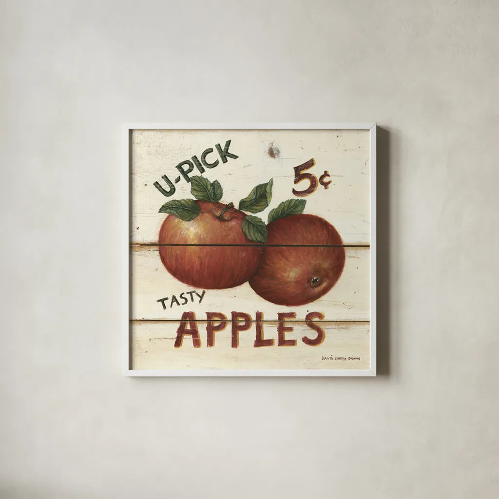 U-Pick Apples by David Carter Brown. Shown in a crisp white glass frame for a clean and minimalist style. Available as an archival giclee rolled canvas, fine art paper, or poster print. SKU 3182a.