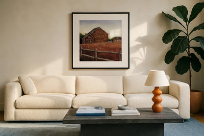 Weathered Barns by David Carter Brown. Displayed in a glass frame with matte in a clean modern living room. Available as an archival giclee rolled canvas, fine art paper, or poster print. SKU 19505a.