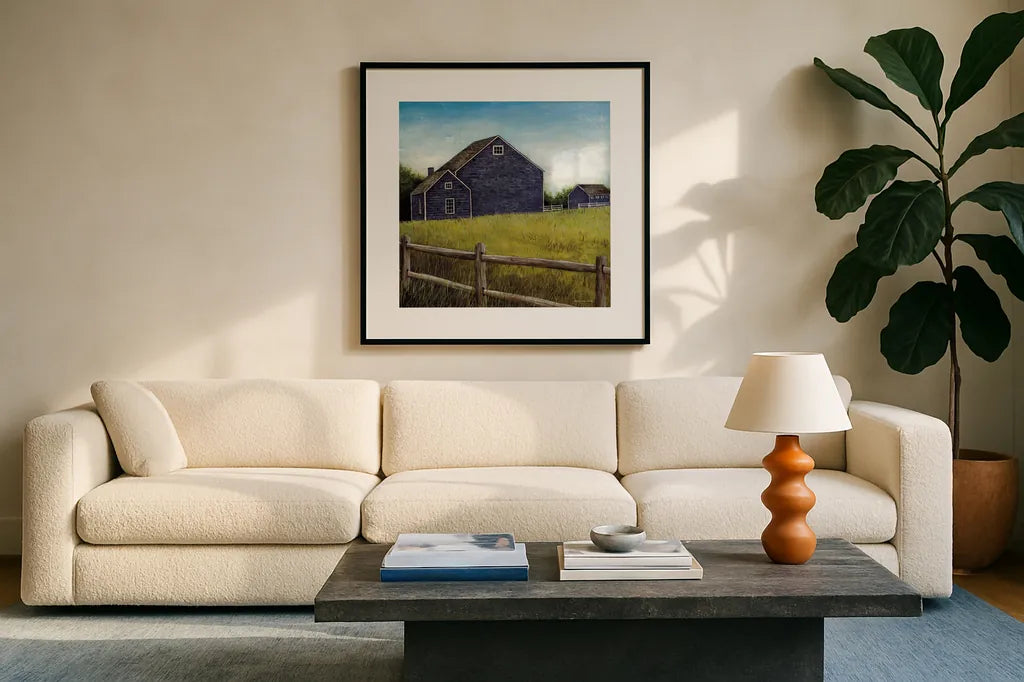 Weathered Barns Navy by David Carter Brown. Displayed in a glass frame with matte in a clean modern living room. Available as an archival giclee rolled canvas, fine art paper, or poster print. SKU 70435a.