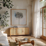 Agapanthus II by Deborah Revell. Shown in a natural wood frame in a cozy modern living room. Available as an archival giclee rolled canvas, fine art paper, or poster print. SKU 91622a.