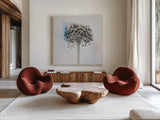 Agapanthus II by Deborah Revell. Shown as extra-large giant wall art in a modern living room. Available as an archival giclee rolled canvas, fine art paper, or poster print. SKU 91622a.