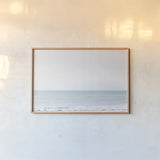 Aqua Sea by Deborah Revell. shown as a paper print in a natural frame. Available as a archival giclee rolled canvas, fine art paper, or poster print. SKU 100316i.