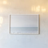 Aqua Sea by Deborah Revell. shown as a paper print in a white frame. Available as a archival giclee rolled canvas, fine art paper, or poster print. SKU 100316i.