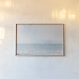 Aqua Sea by Deborah Revell. shown as a paper print in a natural frame. Available as a archival giclee rolled canvas, fine art paper, or poster print. SKU 91247i.