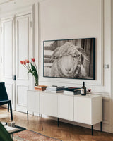 Barn Buddy I by Deborah Revell. shown as a framed stretched canvas in a living room above a console. Available as a archival giclee rolled canvas, fine art paper, or poster print. SKU 96301i.