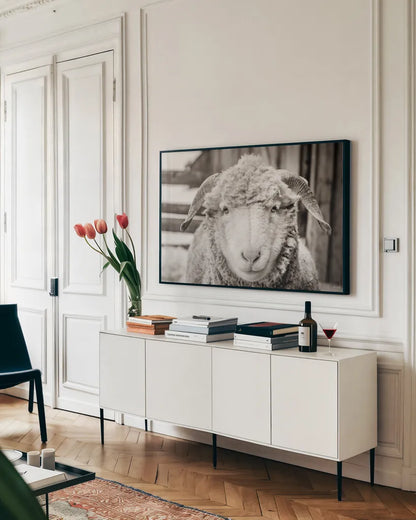 Barn Buddy I by Deborah Revell. shown as a framed stretched canvas in a living room above a console. Available as a archival giclee rolled canvas, fine art paper, or poster print. SKU 96301i.