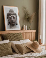 Beach Buddha by Deborah Revell. shown as a paper print in a natural frame. Available as a archival giclee rolled canvas, fine art paper, or poster print. SKU 93996h.