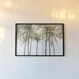 Beach Palms by Deborah Revell. shown as a paper print in a black flame. Available as a archival giclee rolled canvas, fine art paper, or poster print. SKU 104902i.