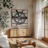 Bike Detail II by Deborah Revell. Shown in a natural wood frame in a cozy modern living room. Available as an archival giclee rolled canvas, fine art paper, or poster print. SKU 104370a.