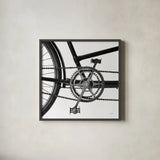 Bike Detail III by Deborah Revell. Shown in a sleek black glass frame for a contemporary gallery look. Available as an archival giclee rolled canvas, fine art paper, or poster print. SKU 104371a.