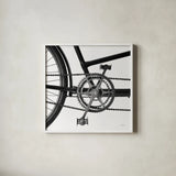 Bike Detail III by Deborah Revell. Shown in a crisp white glass frame for a clean and minimalist style. Available as an archival giclee rolled canvas, fine art paper, or poster print. SKU 104371a.