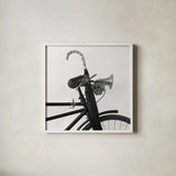 Bike Detail IV by Deborah Revell. Shown in a crisp white glass frame for a clean and minimalist style. Available as an archival giclee rolled canvas, fine art paper, or poster print. SKU 104372a.