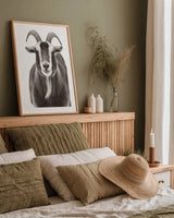 Billy Goats Gruff III by Deborah Revell. shown as a paper print in a natural frame. Available as a archival giclee rolled canvas, fine art paper, or poster print. SKU 96295h.