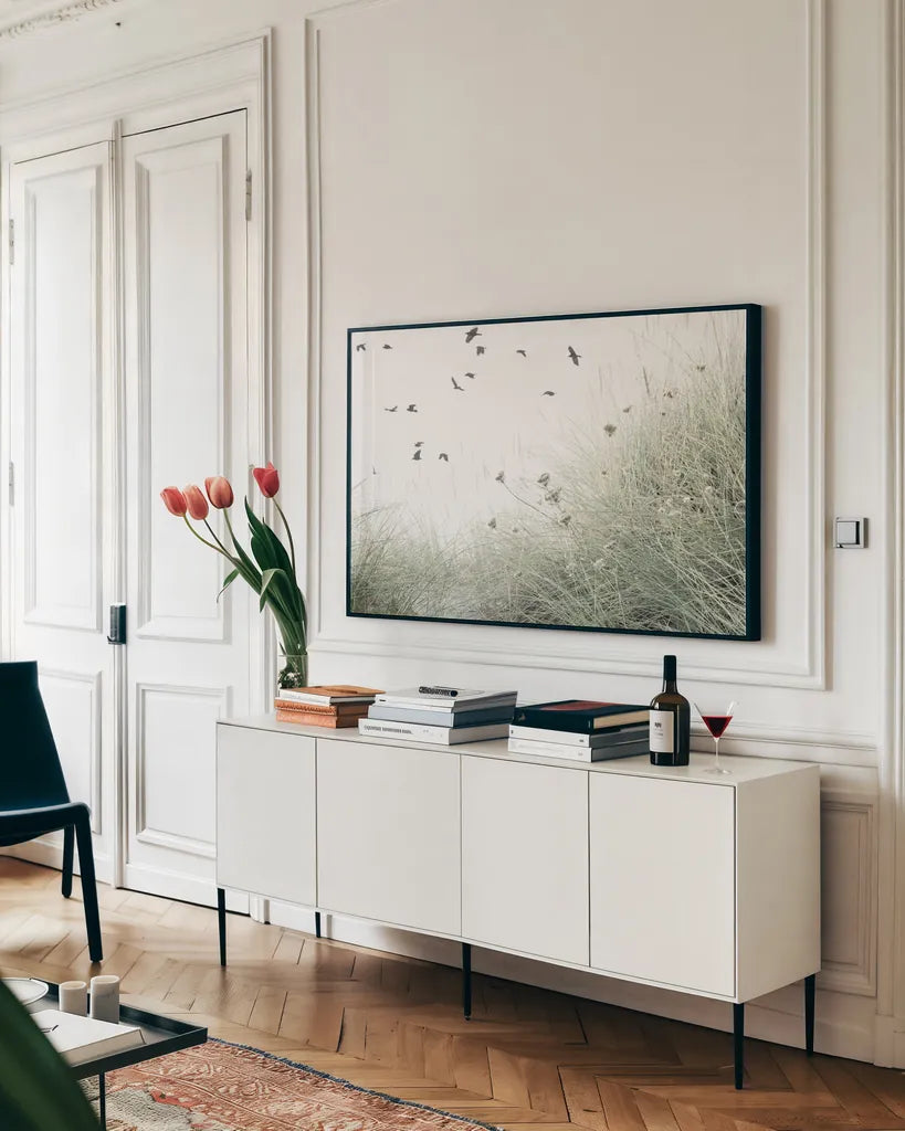 Birds Flying South by Deborah Revell. shown as a framed stretched canvas in a living room above a console. Available as a archival giclee rolled canvas, fine art paper, or poster print. SKU 95478i.