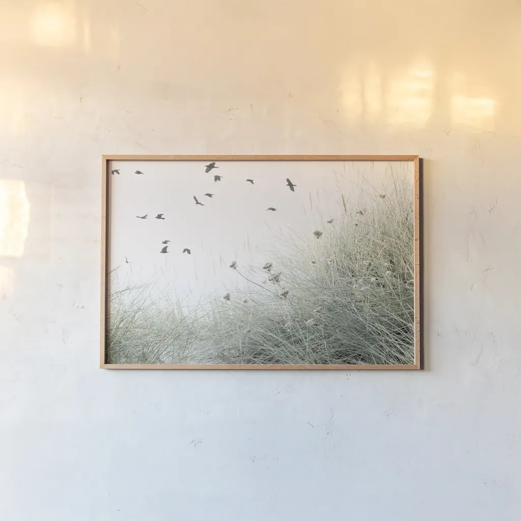 Birds Flying South by Deborah Revell. shown as a paper print in a natural frame. Available as a archival giclee rolled canvas, fine art paper, or poster print. SKU 95478i.