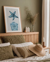 Blue Bay II by Deborah Revell. shown as a paper print in a natural frame. Available as a archival giclee rolled canvas, fine art paper, or poster print. SKU 91277h.
