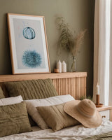 Blue Bay III by Deborah Revell. shown as a paper print in a natural frame. Available as a archival giclee rolled canvas, fine art paper, or poster print. SKU 91278h.
