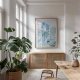 Blue Bay V by Deborah Revell. shown as a print in a natural wood frame in a dining room. Available as a archival giclee rolled canvas, fine art paper, or poster print. SKU 91280h.