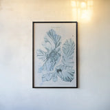 Blue Bay V by Deborah Revell. shown as a paper print in a black flame. Available as a archival giclee rolled canvas, fine art paper, or poster print. SKU 91280h.