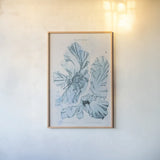 Blue Bay V by Deborah Revell. shown as a paper print in a natural frame. Available as a archival giclee rolled canvas, fine art paper, or poster print. SKU 91280h.