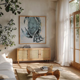 Blue Crab by Deborah Revell. Shown in a natural wood frame in a cozy modern living room. Available as an archival giclee rolled canvas, fine art paper, or poster print. SKU 91161a.