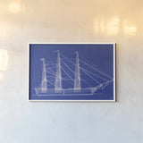 Blue Schooner I by Deborah Revell. shown as a paper print in a white frame. Available as a archival giclee rolled canvas, fine art paper, or poster print. SKU 104263i.