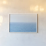 Blue Sea by Deborah Revell. shown as a paper print in a white frame. Available as a archival giclee rolled canvas, fine art paper, or poster print. SKU 103791i.