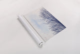 Blue Tree by Deborah Revell. shown as a rolled paper print. Available as archival giclee rolled canvas, fine art paper, or poster print. SKU 90973h.