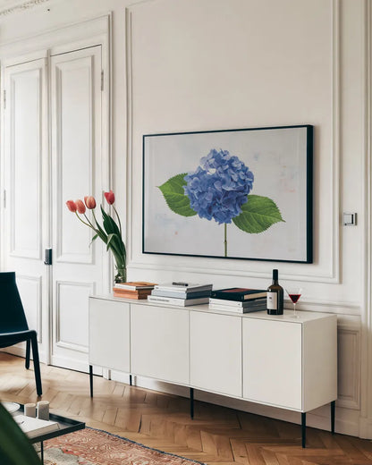 Bright Blue Hydrangea by Deborah Revell. shown as a framed stretched canvas in a living room above a console. Available as a archival giclee rolled canvas, fine art paper, or poster print. SKU 93150i.